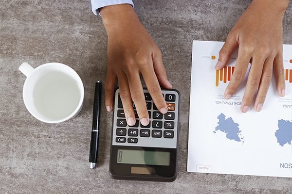 A student checking and balancing finance